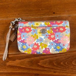 Flower printed Coach wristlet